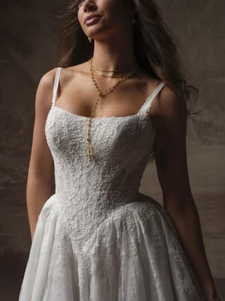 Sottero & Midgley a-line wedding dress “Ivandra” at Bridal by Brittany Ann, Cleveleys — back & side