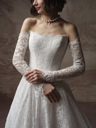 Maggie Sottero ballgown wedding dress “Serena” at Bridal by Brittany Ann, Cleveleys — back & side
