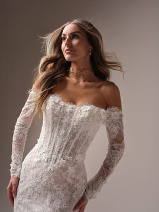 Maggie Sottero fit and flare wedding dress “Takera” at Bridal by Brittany Ann, Cleveleys — back & side